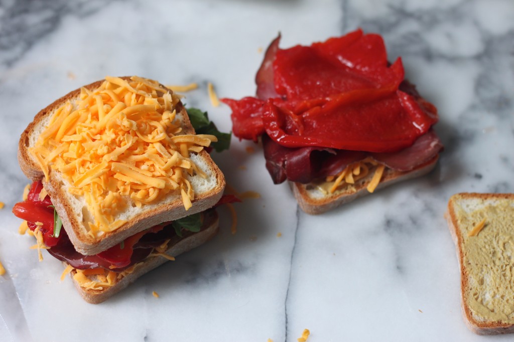 Bresaola, Arugula, and Roasted Red Pepper Cheddar Melts