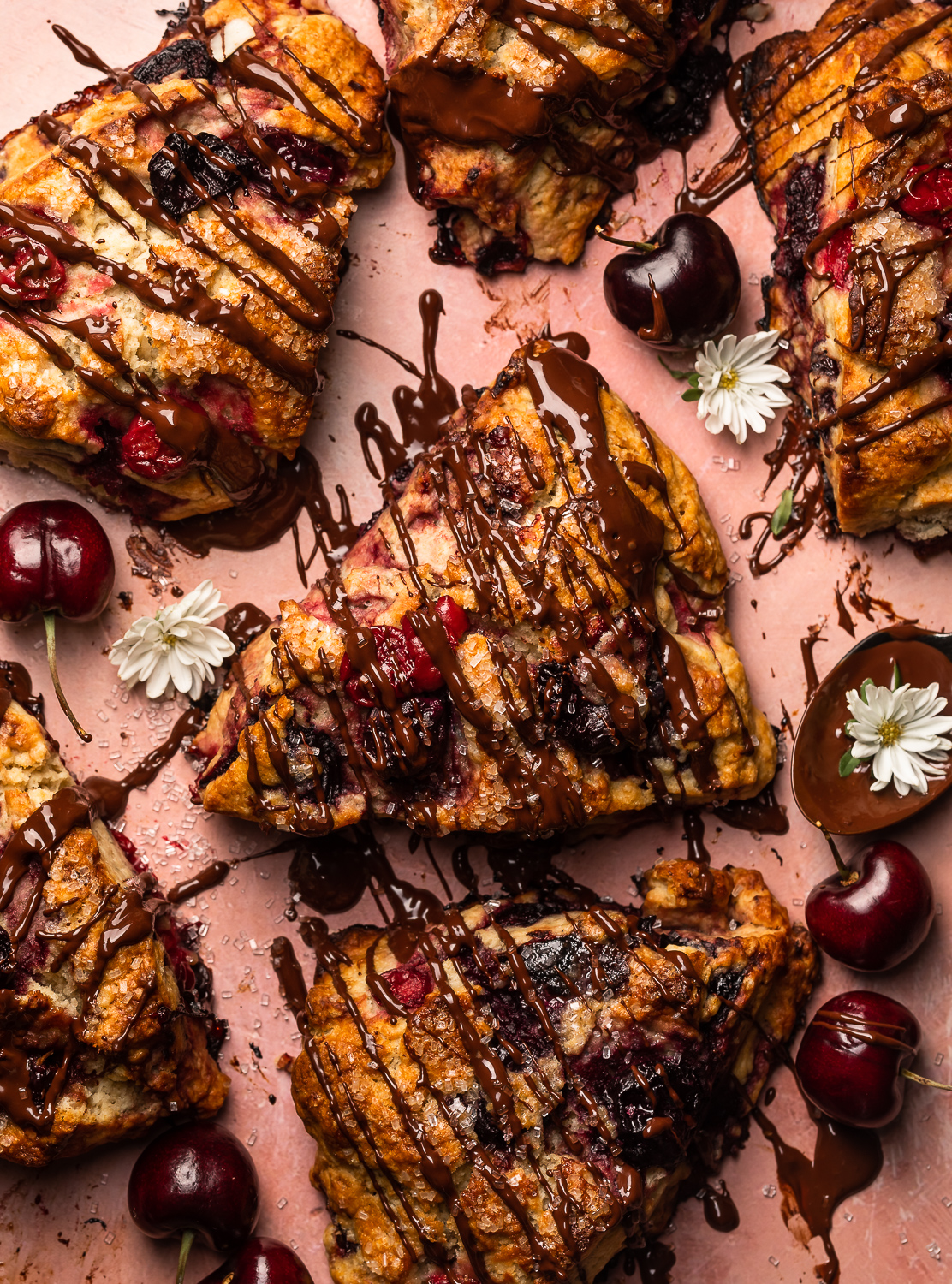 Golden brown, loaded with juicy cherries, and drizzled with dark chocolate, these Chocolate Covered Cherry Scones are a total showstopper! Perfect for breakfast or brunch and so good with a cup of coffee! For an extra chocolate kick, add a 1/2 cup of mini chocolate chips!