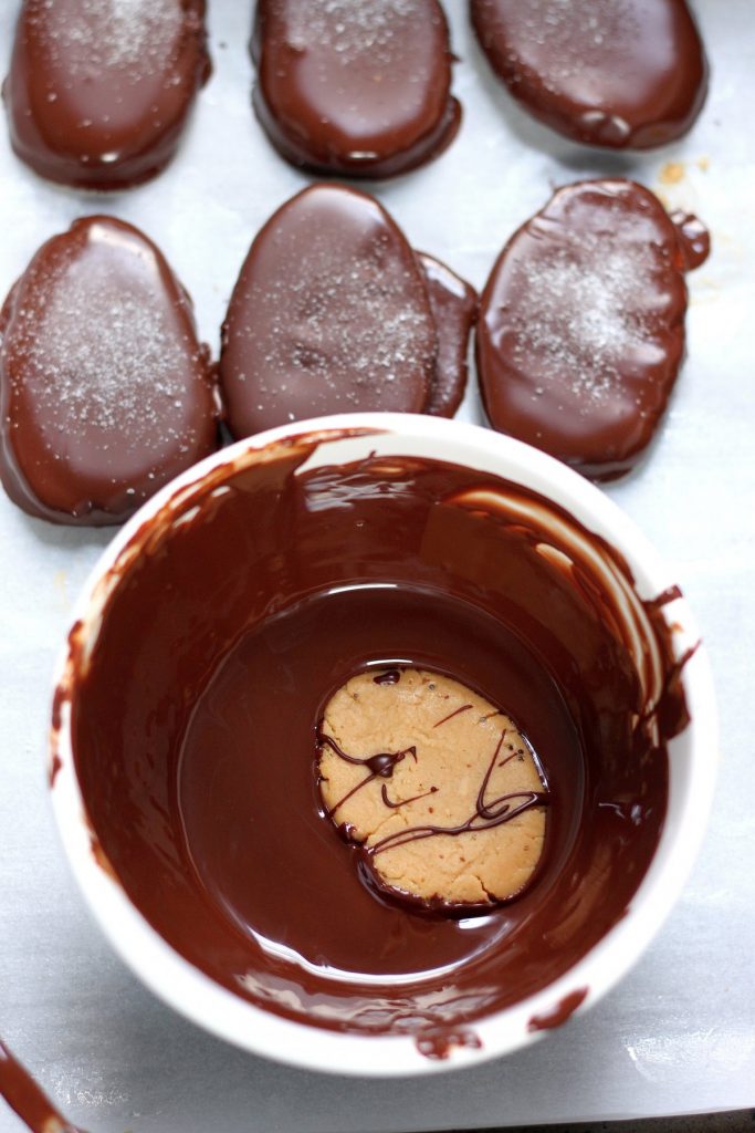 These Homemade Peanut Butter Eggs are sure to be a hit this Easter!!! Made with just a handful of basic ingredients, these salted chocolate covered peanut butter eggs are super easy to whip up!