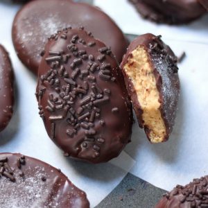 These Homemade Peanut Butter Eggs are sure to be a hit this Easter!!! Made with just a handful of basic ingredients, these salted chocolate covered peanut butter eggs are super easy to whip up!