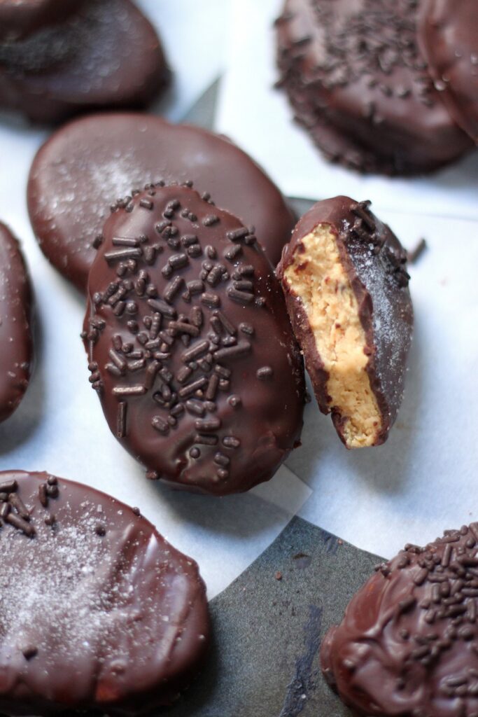 These Homemade Peanut Butter Eggs are sure to be a hit this Easter!!! Made with just a handful of basic ingredients, these salted chocolate covered peanut butter eggs are super easy to whip up!