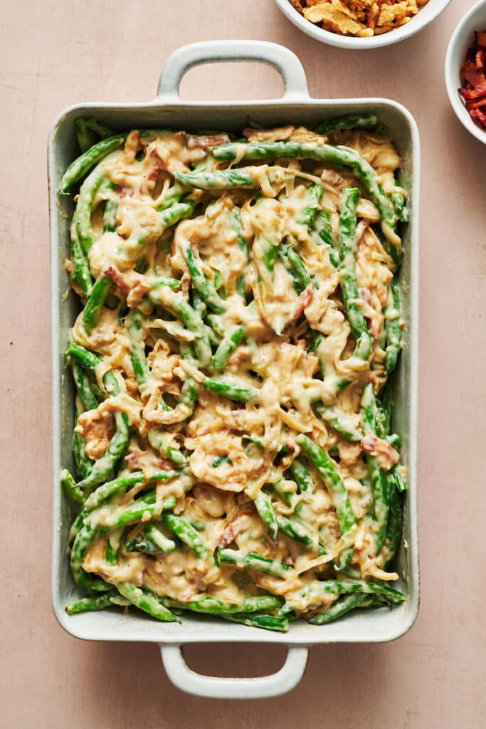Green beans covered in cheese sauce.