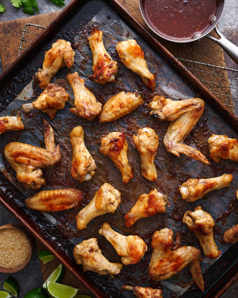 chicken wings on baking sheet