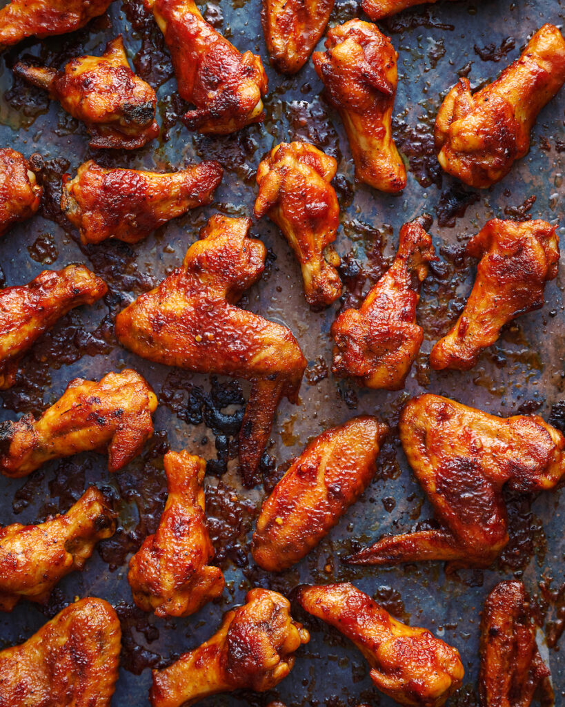 Chicken wings on baking sheet