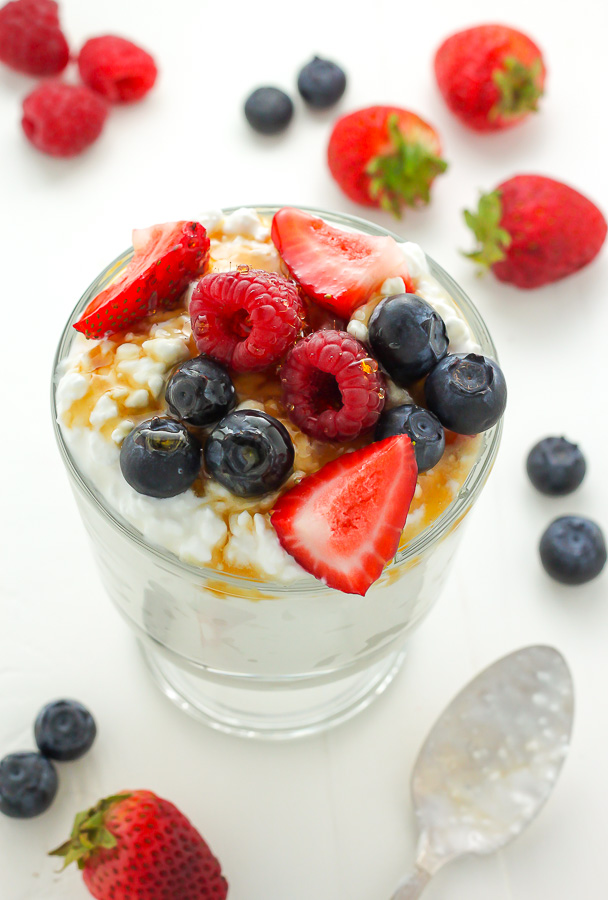 Very Berry Breakfast Parfaits - Creamy Honey and Cinnamon Swirled Breakfast Parfaits are topped with a trio of fresh berries! The best part? This healthy and delicious protein-packed treat is ready in 5 minutes!
