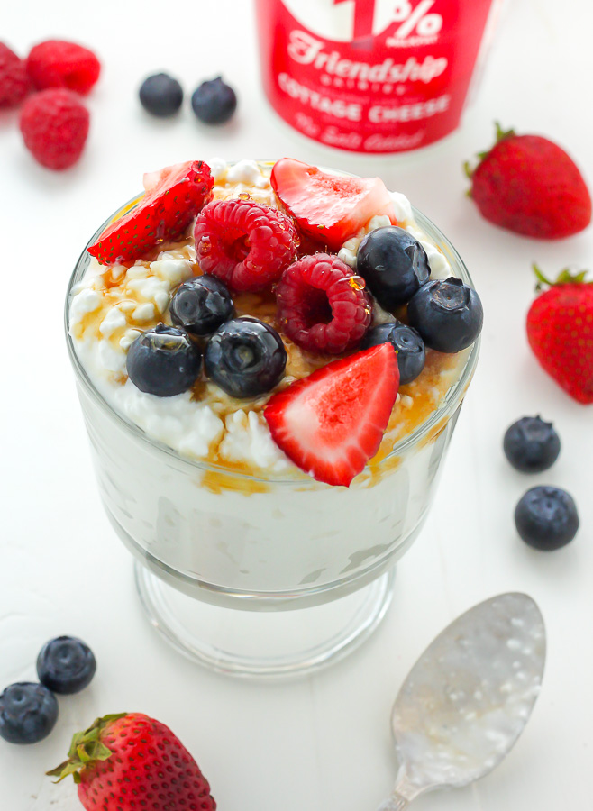 Very Berry Breakfast Parfaits - Creamy Honey and Cinnamon Swirled Breakfast Parfaits are topped with a trio of fresh berries! The best part? This healthy and delicious protein-packed treat is ready in 5 minutes!