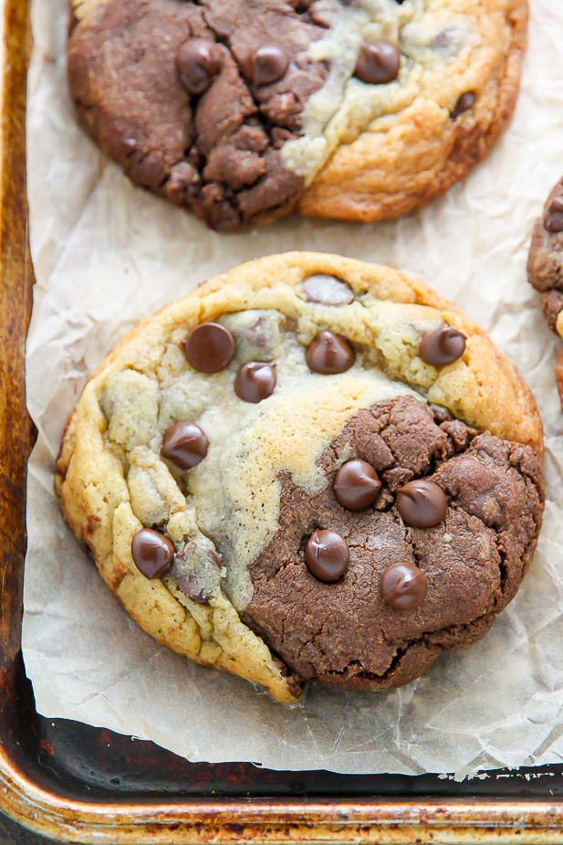 Baked brookies on a parchment paper lined baking sheet.