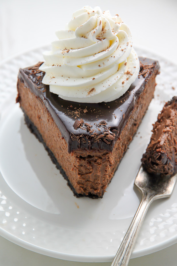 Oreo Crusted Chocolate Cheesecake topped with Chocolate Ganache and spiked with Kahlua... need I say more?!