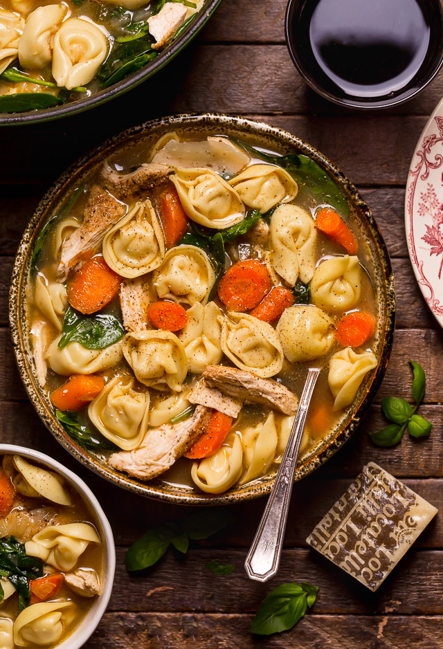 Nothing screams cozy like a giant bowl of Italian Chicken Tortellini Soup! Loaded with tender cheese tortellini, shredded chicken, fresh baby spinach, carrots, and celery... all in a super flavorful chicken broth! Serve this family favorite with extra parmesan cheese and crusty bread.