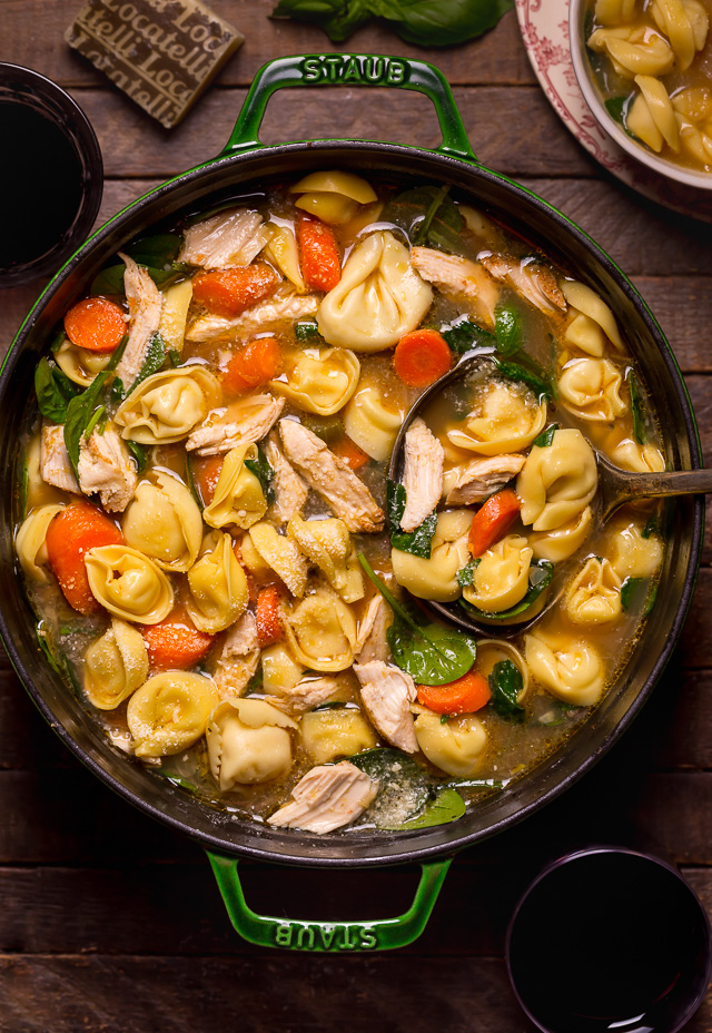 Nothing screams cozy like a giant bowl of Italian Chicken Tortellini Soup! Loaded with tender cheese tortellini, shredded chicken, fresh baby spinach, carrots, and celery... all in a super flavorful chicken broth! Serve this family favorite with extra parmesan cheese and crusty bread.