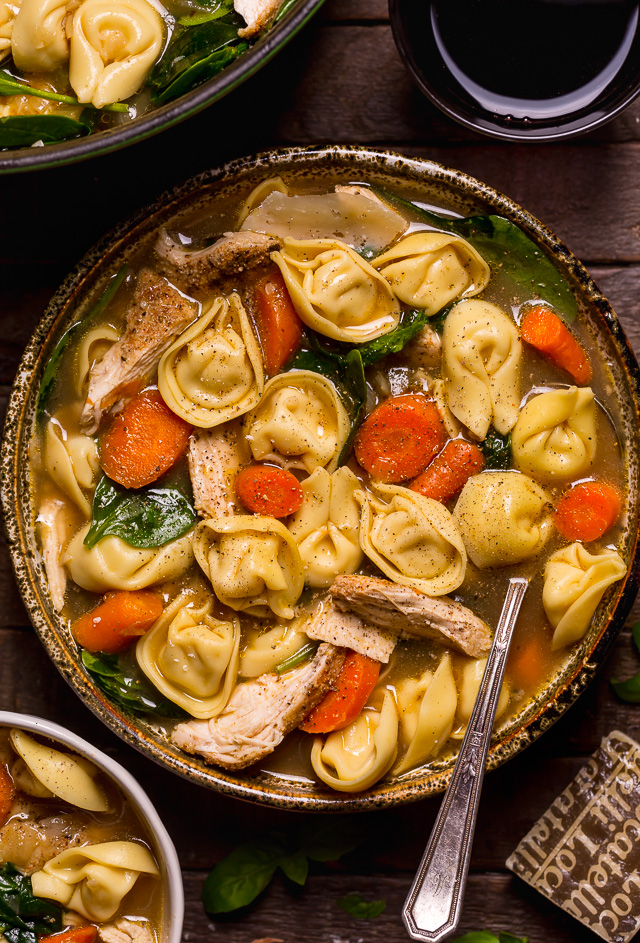 Nothing screams cozy like a giant bowl of Italian Chicken Tortellini Soup! Loaded with tender cheese tortellini, shredded chicken, fresh baby spinach, carrots, and celery... all in a super flavorful chicken broth! Serve this family favorite with extra parmesan cheese and crusty bread.