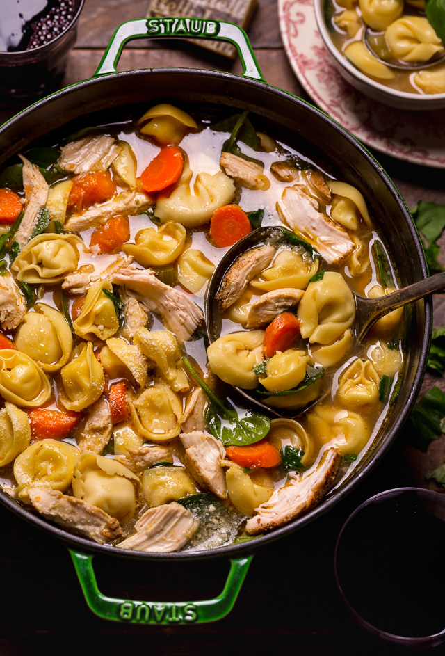 Nothing screams cozy like a giant bowl of Italian Chicken Tortellini Soup! Loaded with tender cheese tortellini, shredded chicken, fresh baby spinach, carrots, and celery... all in a super flavorful chicken broth! Serve this family favorite with extra parmesan cheese and crusty bread.