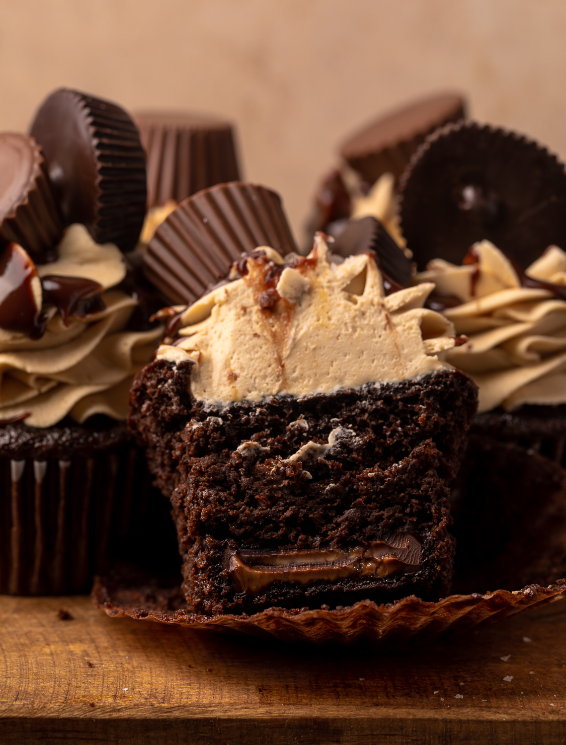 Have a peanut butter lover in your life? You have to bake them these Ultimate Chocolate Peanut Butter Cupcakes! Featuring moist chocolate cupcakes that are stuffed with a peanut butter cup, topped with peanut butter frosting, milk chocolate peanut butter ganache, and chopped peanuts, these are always a crowd-pleaser!