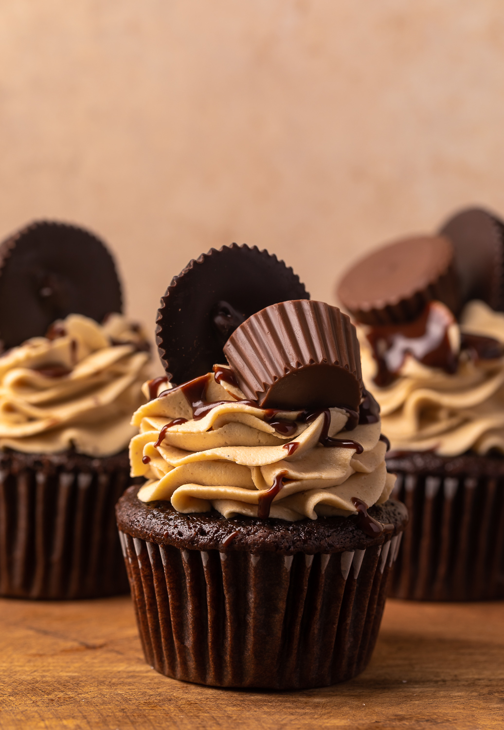 Have a peanut butter lover in your life? You have to bake them these Ultimate Chocolate Peanut Butter Cupcakes! Featuring moist chocolate cupcakes that are stuffed with a peanut butter cup, topped with peanut butter frosting, milk chocolate peanut butter ganache, and chopped peanuts, these are always a crowd-pleaser!