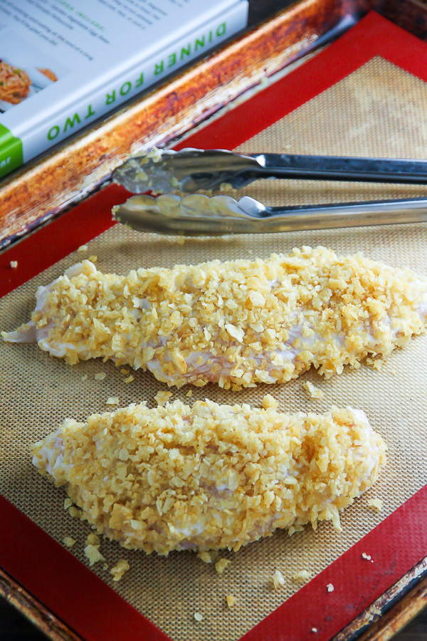 Fluffy buttermilk waffles topped with crispy "oven-fried" chicken and creamy white pepper gravy. Brunch perfection.