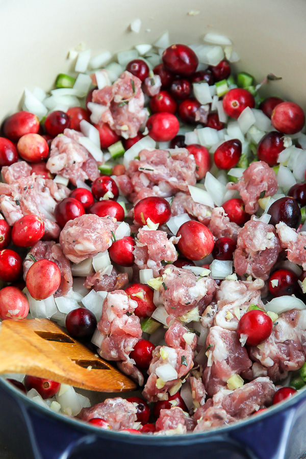 My go-to holiday stuffing recipe loaded with fresh herbs, chopped apples, cranberries, and sausage! Bonus: This recipe can be made ahead to help you save time.