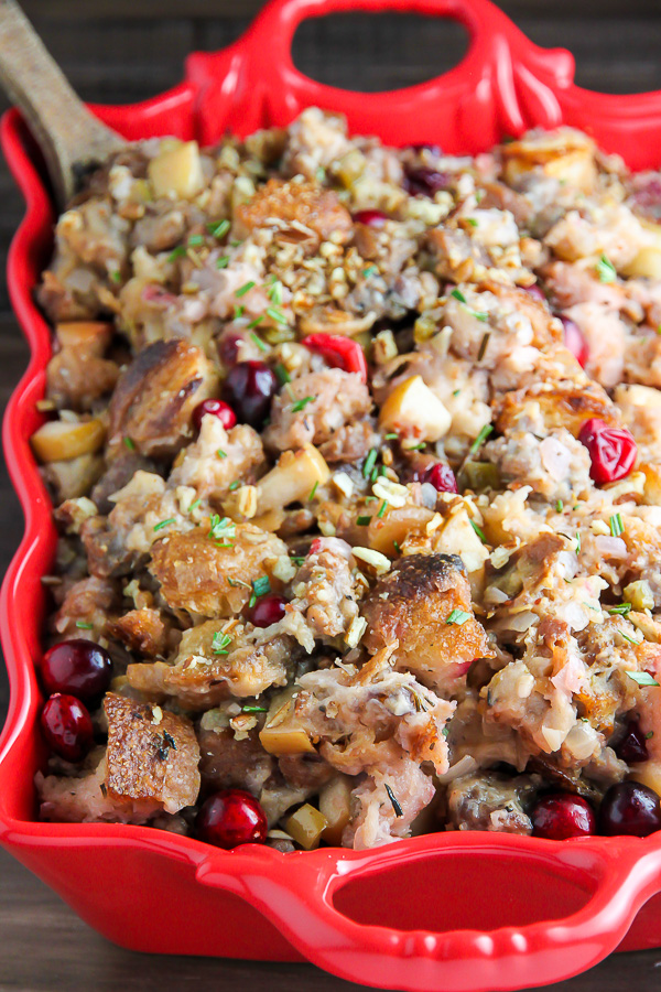 My go-to holiday stuffing recipe loaded with fresh herbs, chopped apples, cranberries, and sausage! Bonus: This recipe can be made ahead to help you save time.