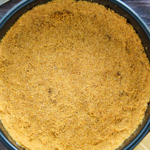 Supremely smooth and creamy homemade Lemon cheesecake topped with fresh Blueberry swirls. All layered on top of a buttery homemade graham cracker crust.