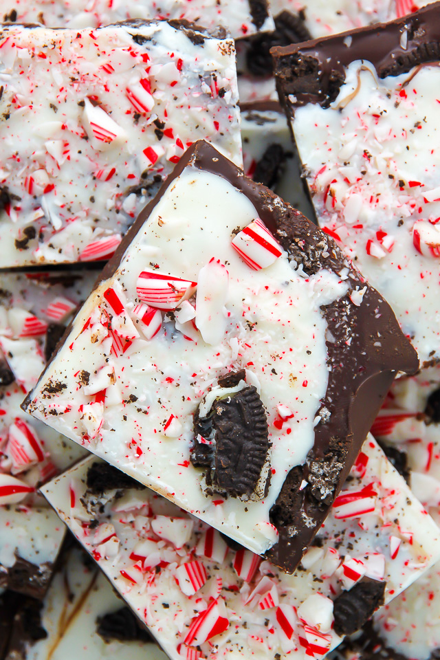 Layered peppermint chocolate bark topped with crushed candy canes and Oreo cookies!