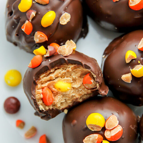 Creamy and crunchy chocolate peanut butter truffles loaded with mini Reese's pieces.