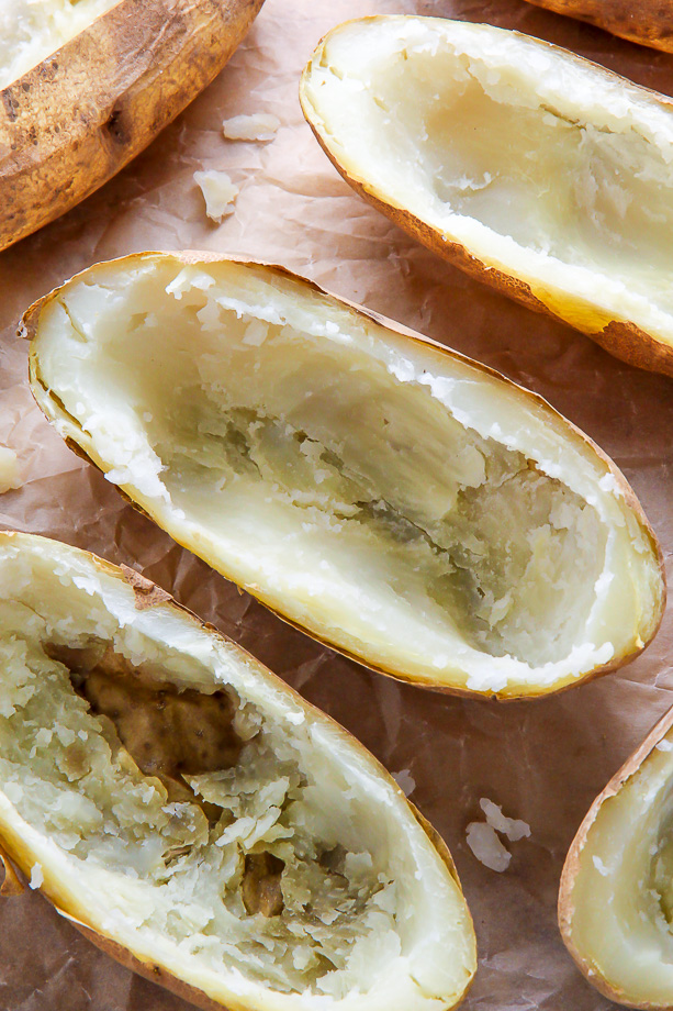 Potato skins on a baking sheet.