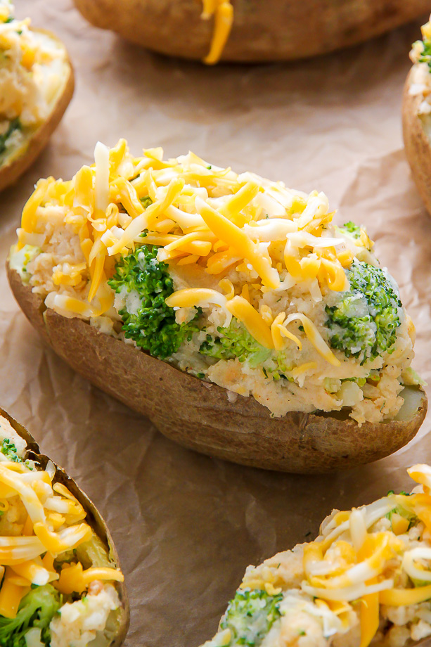 Potato skins stuffed with mashed potato filling and topped with cheese and broccoli.