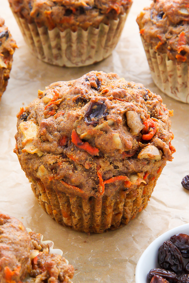 Morning glory muffin on brown parchment paper.