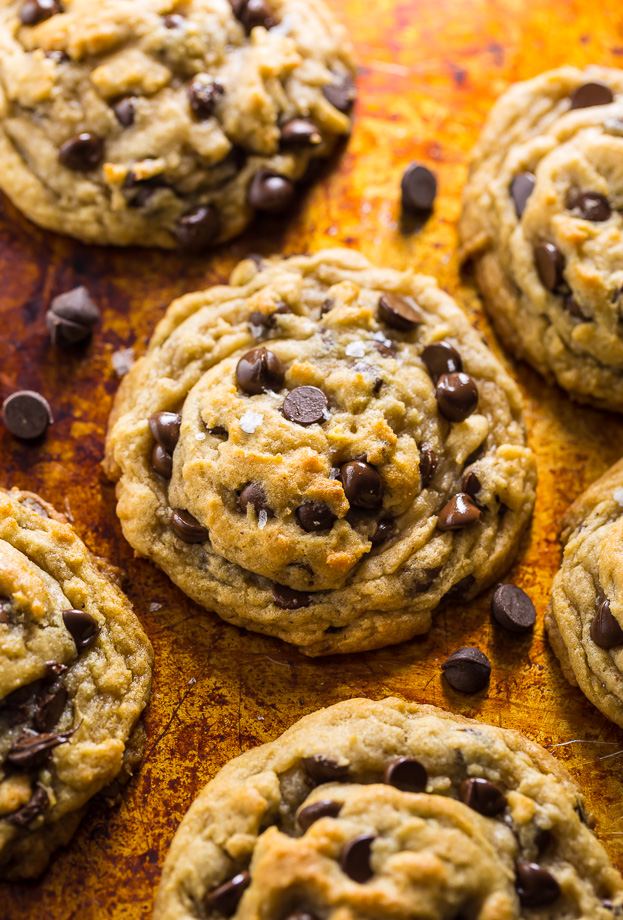 Vegan chocolate chip cookies on a baking sheet.