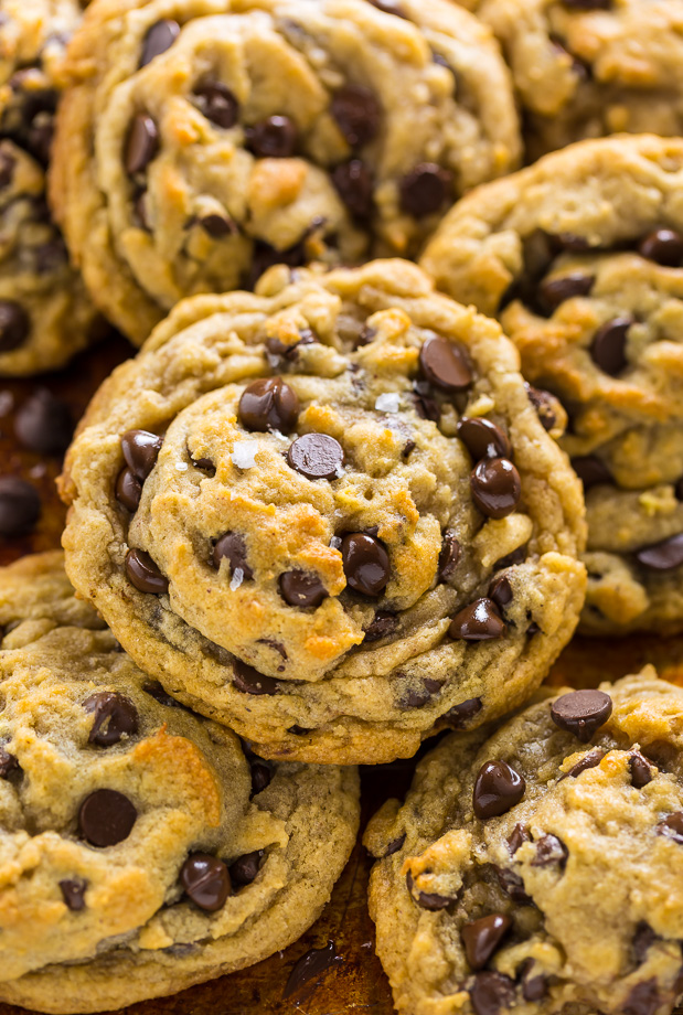 These Vegan Chocolate Chip Cookies are thick, chewy, and loaded with gooey chocolate. No one will guess they're vegan!