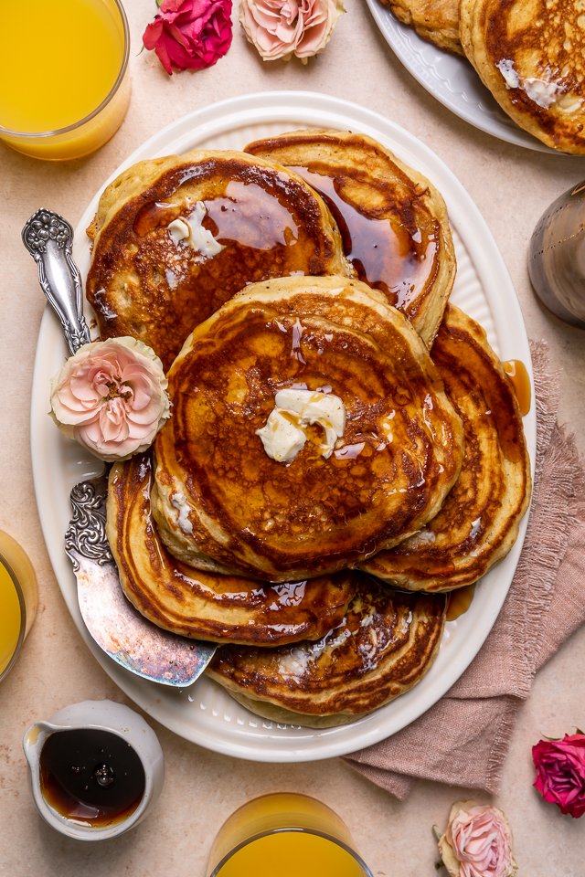 Crispy buttermilk pancakes on a serving platter.