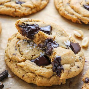 Ultra thick soft batch peanut butter cookies loaded with chocolate chunks! Perfect with a cup of coffee or a cold glass of milk.