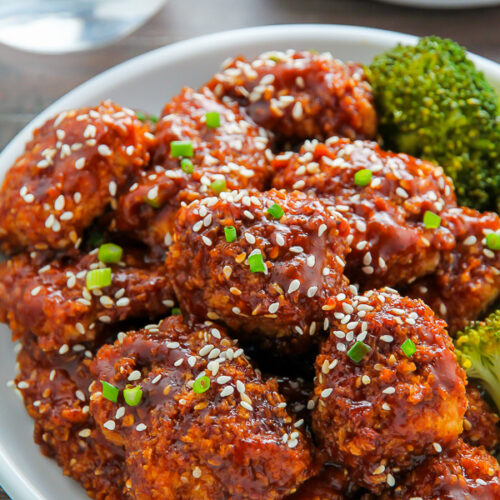 Crispy, saucy, and supremely flavorful Sesame chicken! Oven baked and ready in less than an hour.