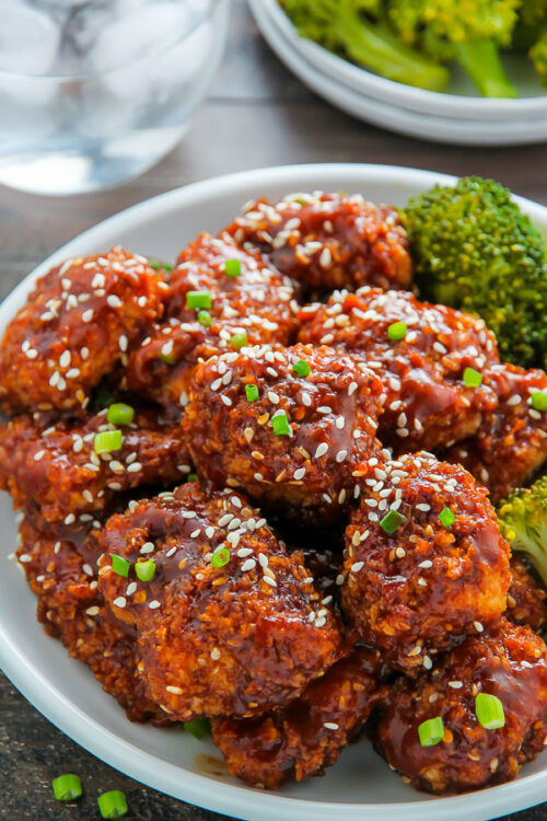 Crispy, saucy, and supremely flavorful Sesame chicken! Oven baked and ready in less than an hour.