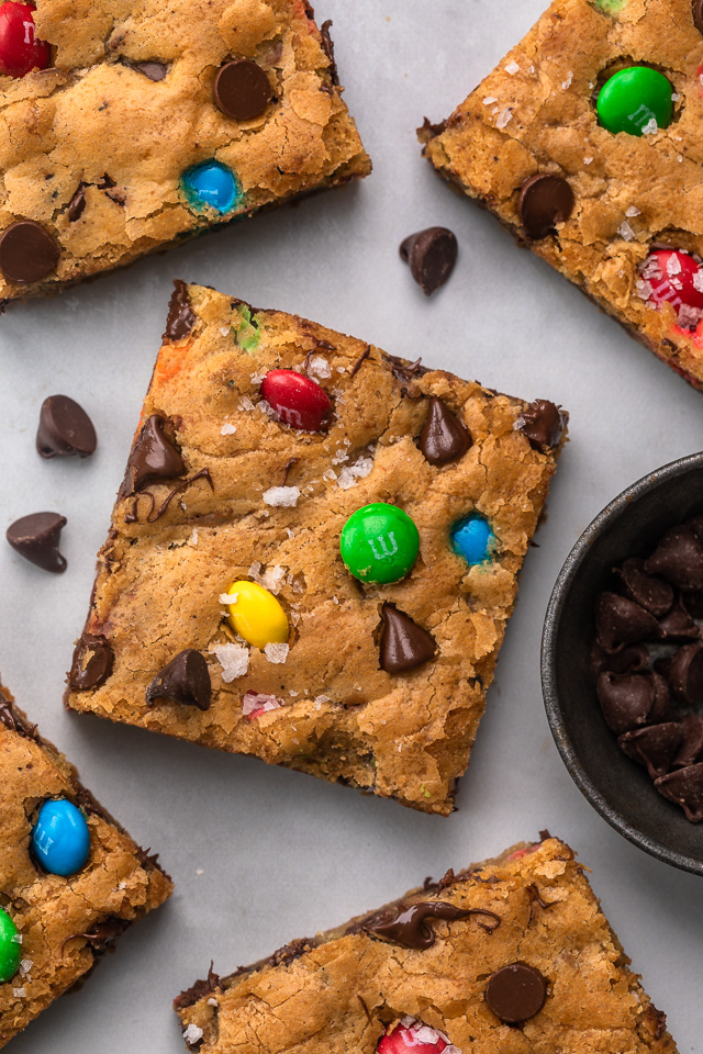 These thick and chewy Brown Butter M&M Blondies are irresistible! An easy cookie bar that's loaded with chocolate chips and M&M candies. Loved by kids and adults, this blondie recipe is always a crowd pleaser!