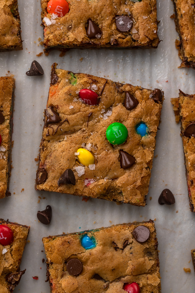 These thick and chewy Brown Butter M&M Blondies are irresistible! An easy cookie bar that's loaded with chocolate chips and M&M candies. Loved by kids and adults, this blondie recipe is always a crowd pleaser!