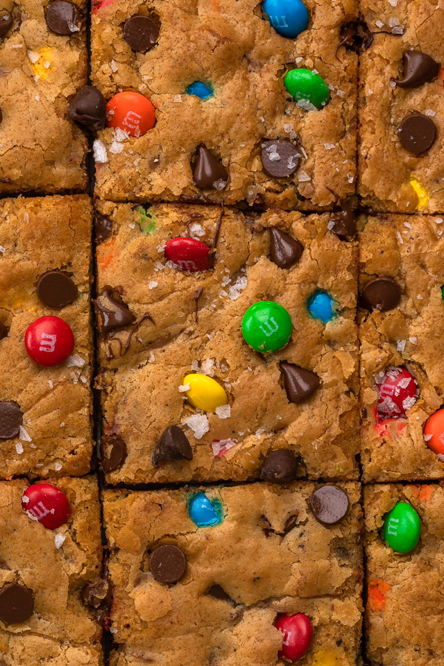 These thick and chewy Brown Butter M&M Blondies are irresistible! An easy cookie bar that's loaded with chocolate chips and M&M candies. Loved by kids and adults, this blondie recipe is always a crowd pleaser!
