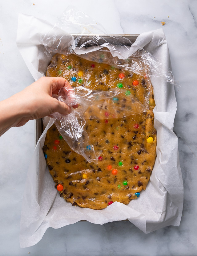These thick and chewy Brown Butter M&M Blondies are irresistible! An easy cookie bar that's loaded with chocolate chips and M&M candies. Loved by kids and adults, this blondie recipe is always a crowd pleaser!