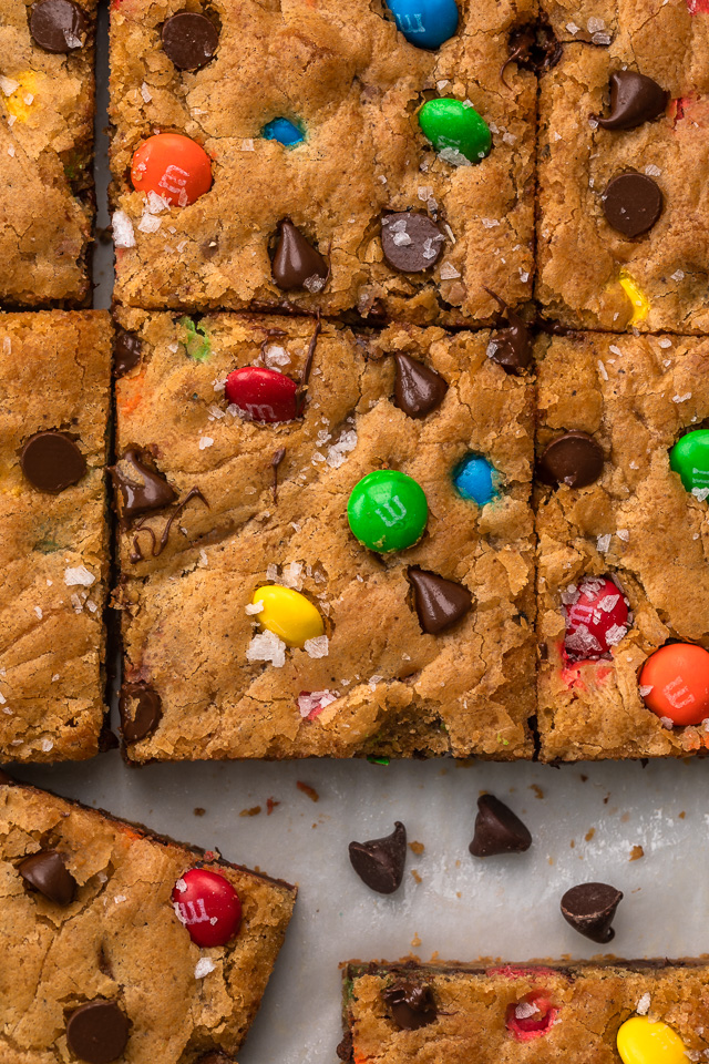 These thick and chewy Brown Butter M&M Blondies are irresistible! An easy cookie bar that's loaded with chocolate chips and M&M candies. Loved by kids and adults, this blondie recipe is always a crowd pleaser!