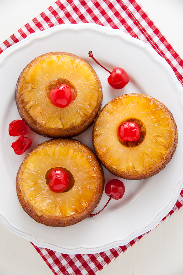 mini pineapple upside down cake from scratch on plate.