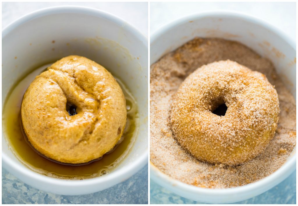 Baked donuts being dipped in butter and cinnamon sugar mixture.