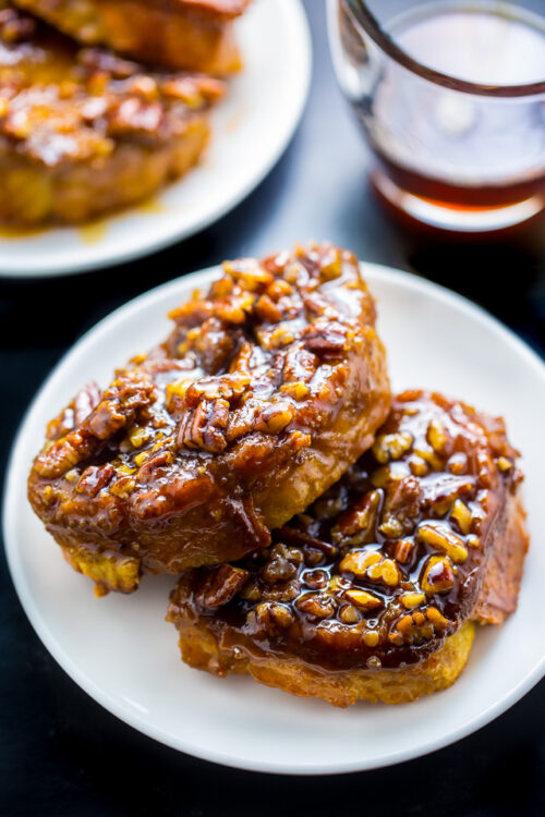 Incredibly EASY Overnight Pecan Pie French Toast! Perfect for holiday brunch. Get the recipe on BakerbyNature.com