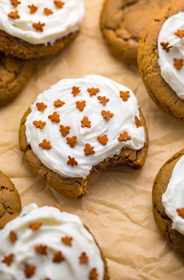 Gingerbread cookies with cream cheese and gingerbread man sprinkles on top.