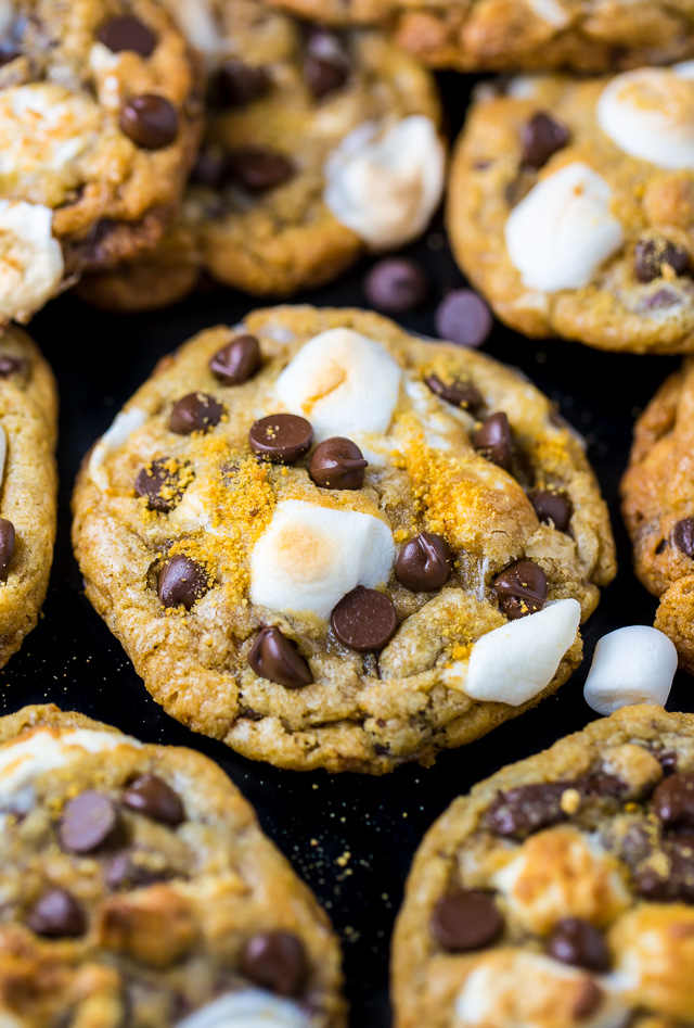 S'mores chocolate chip cookies on a black board.