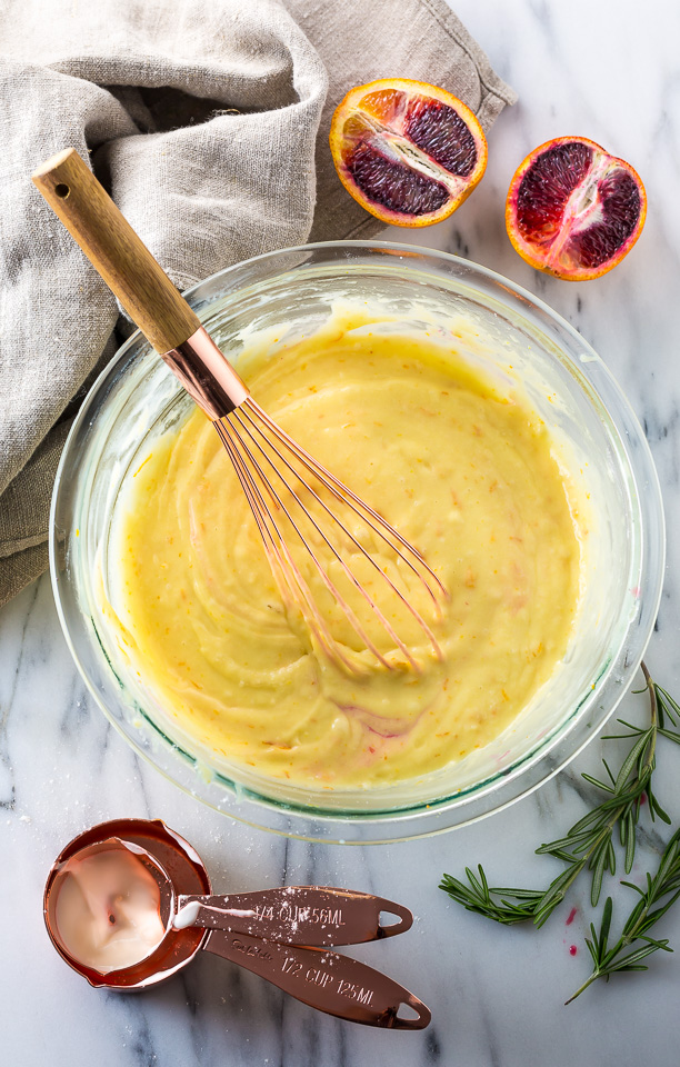 This STUNNING Blood Orange Pound Cake is moist, flavorful, and covered in a vibrant blood orange glaze.