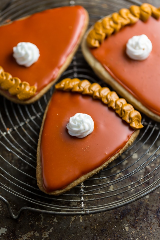 These Pumpkin Spice Cut-Out Cookies are dressed up to look like little slices of pumpkin pie! Does it get any cuter than this?