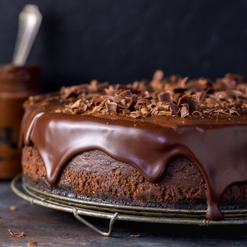 Rich, creamy, and supremely flavorful, this is the ULTIMATE Chocolate Cheesecake! The best part? It's so easy to make and freezer friendly!