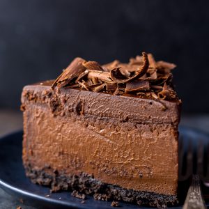 Rich, creamy, and supremely flavorful, this is the ULTIMATE Chocolate Cheesecake! The best part? It's so easy to make and freezer friendly!
