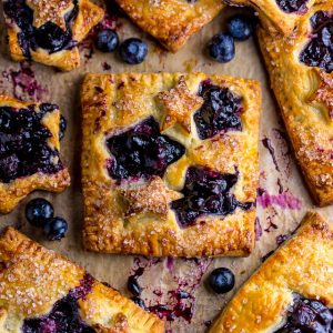 These Blueberry Bourbon Hand Pies are so easy and a total showstopper! You have to try them this Summer!