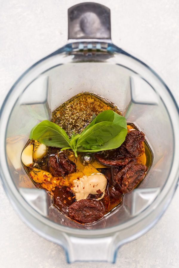 Make sure to buy sun-dried tomatoes that are packed in olive oil. I urge this because you'll use the oil for the salad dressing! Could you use regular olive oil? Technically, yes. But it would be missing that sun-dried infused flavor that makes the dressing extra. So just buy the oil packed tomatoes and trust me on this ;) I'm pretty confident you'll thank me after one bite!