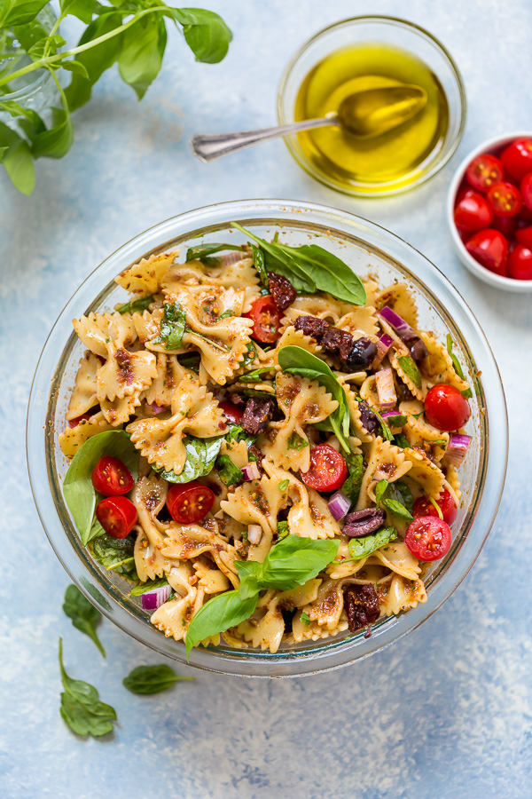 Make sure to buy sun-dried tomatoes that are packed in olive oil. I urge this because you'll use the oil for the salad dressing! Could you use regular olive oil? Technically, yes. But it would be missing that sun-dried infused flavor that makes the dressing extra. So just buy the oil packed tomatoes and trust me on this ;) I'm pretty confident you'll thank me after one bite!